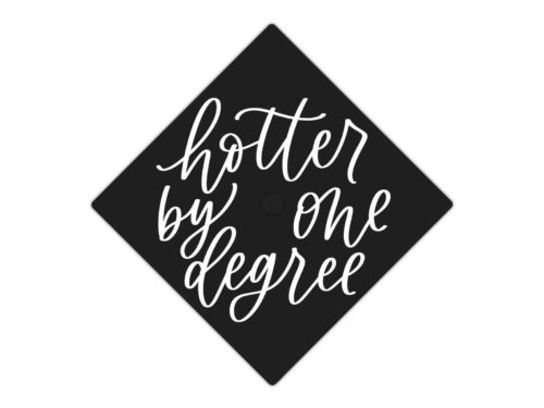Black graduation cap that reads "hotter by one degree" in white script